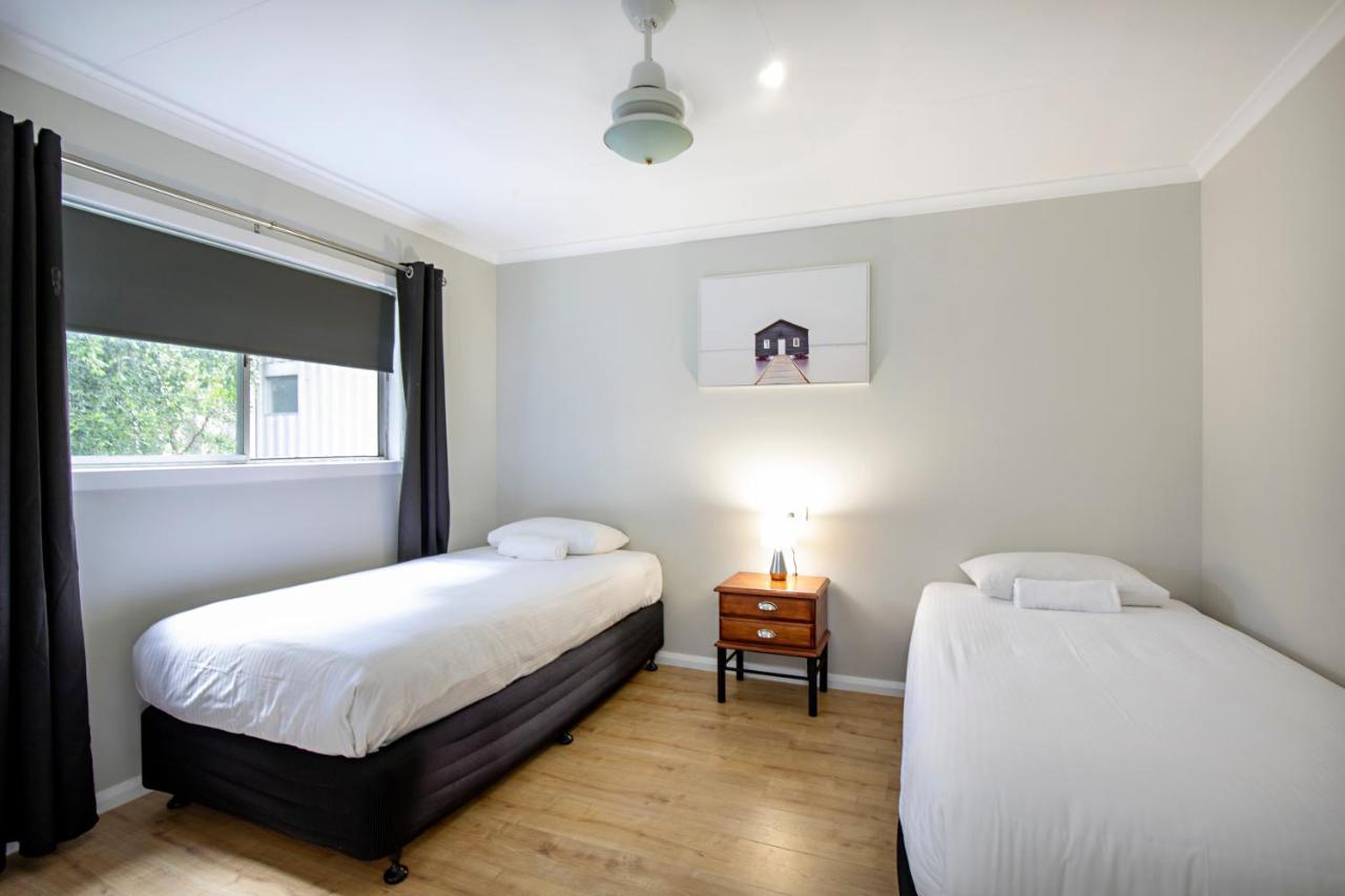 Bush Village Holiday Cabins Airlie Beach Buitenkant foto