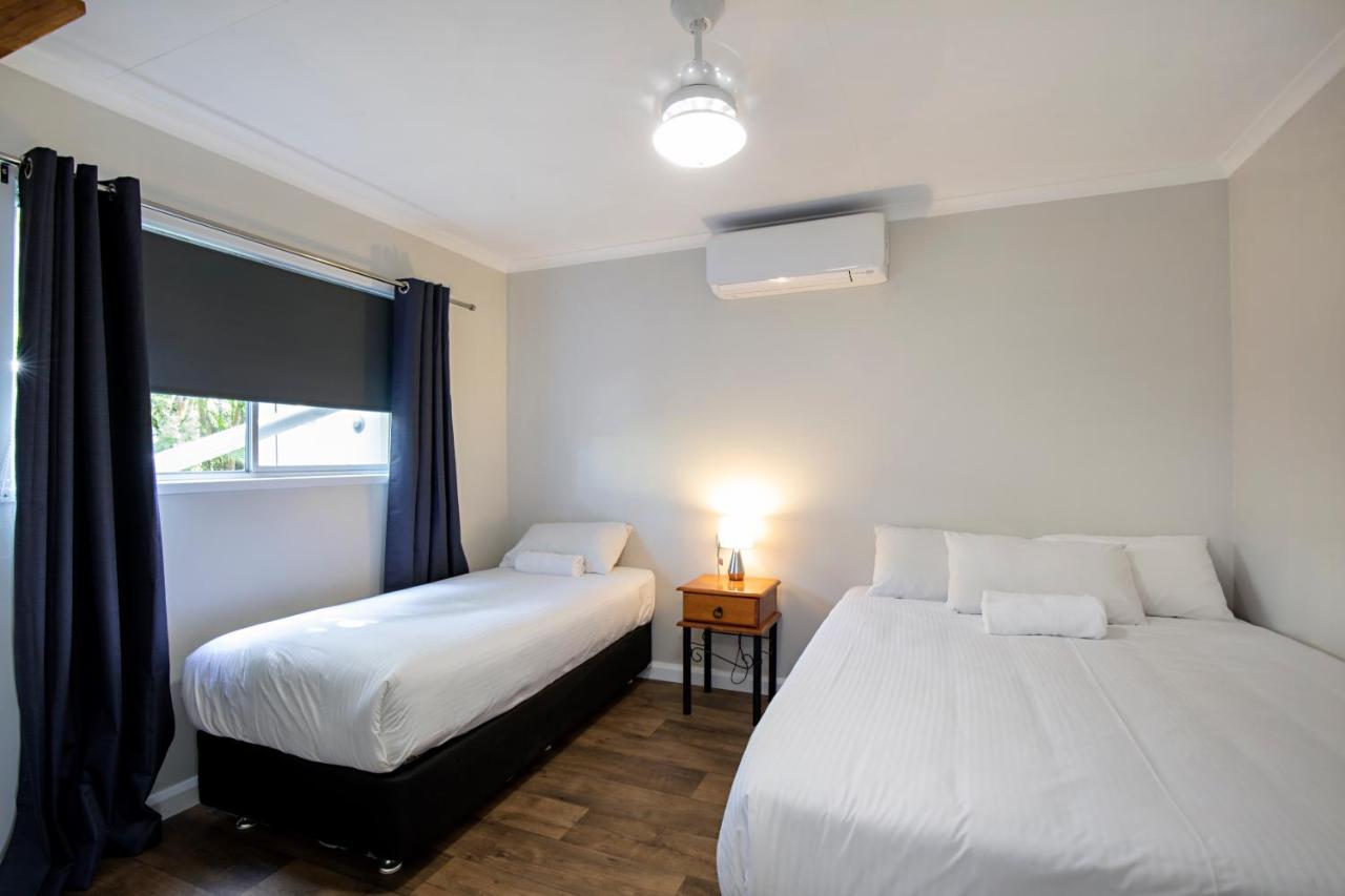 Bush Village Holiday Cabins Airlie Beach Buitenkant foto