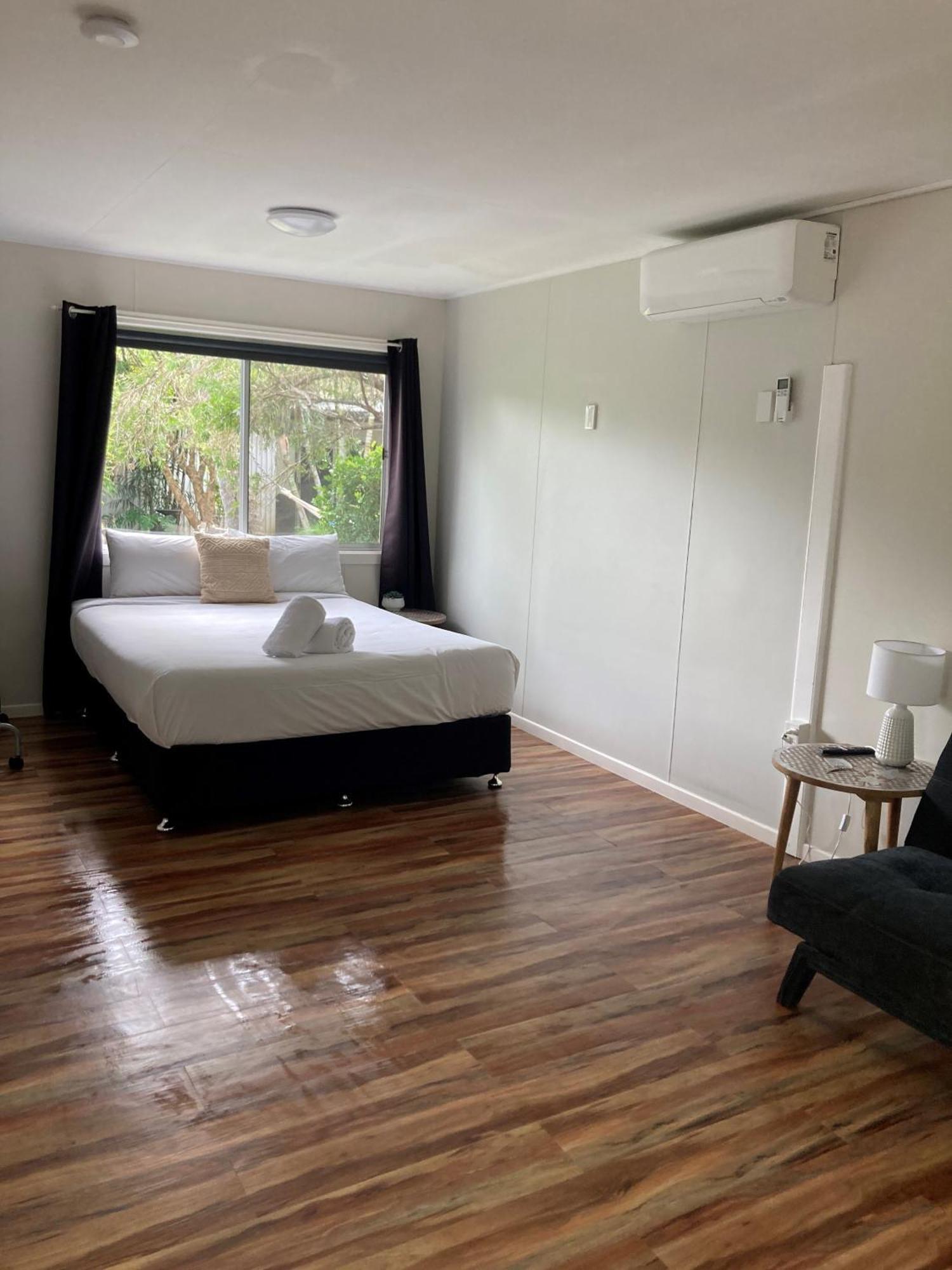 Bush Village Holiday Cabins Airlie Beach Buitenkant foto